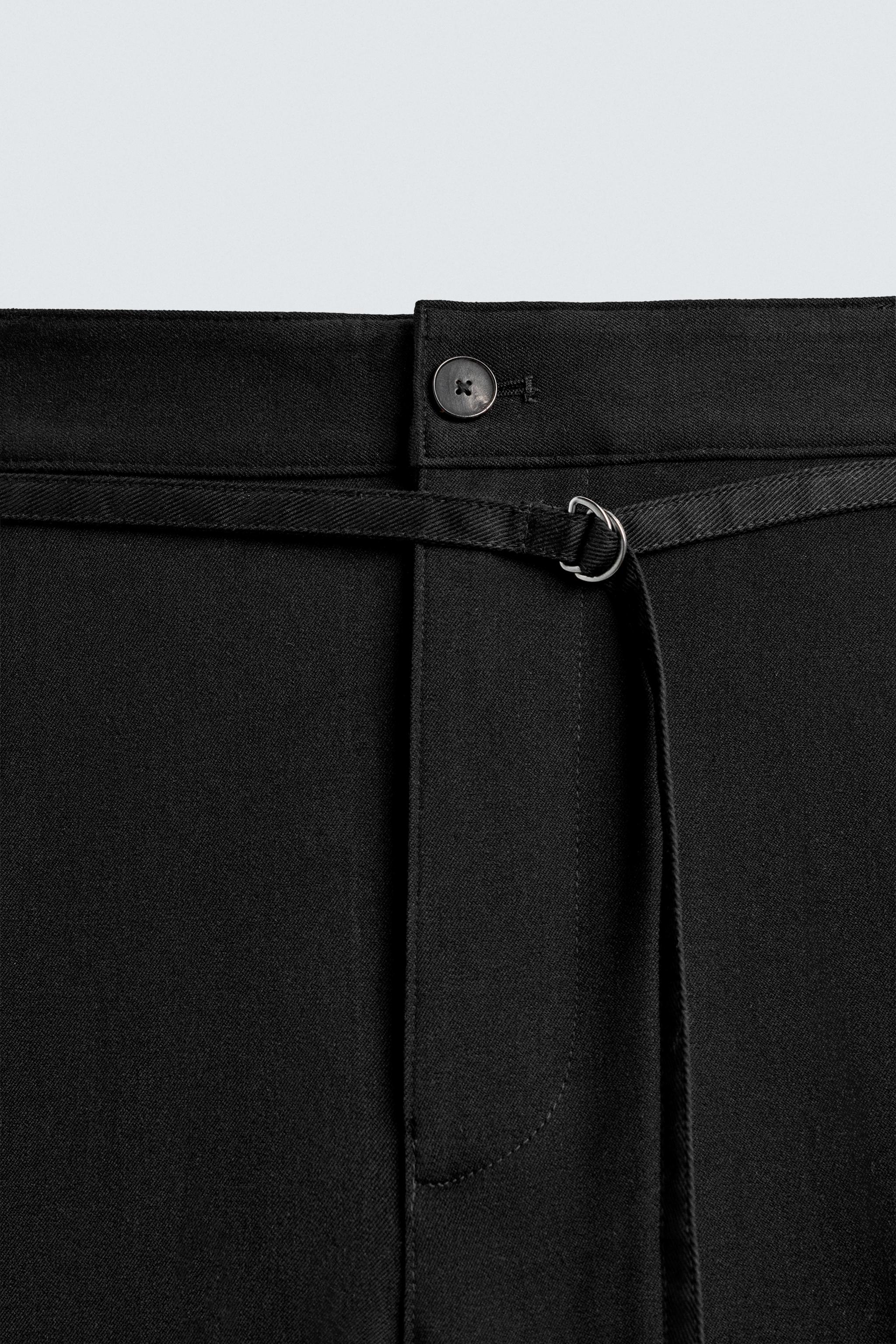 BALLOON PLEATED BELTED PANTS